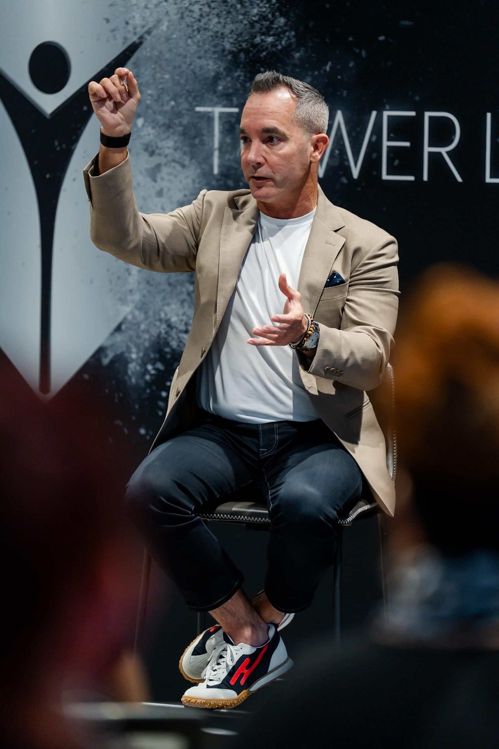 Eric J Morin speaking to a group of doctors at the Tower event space